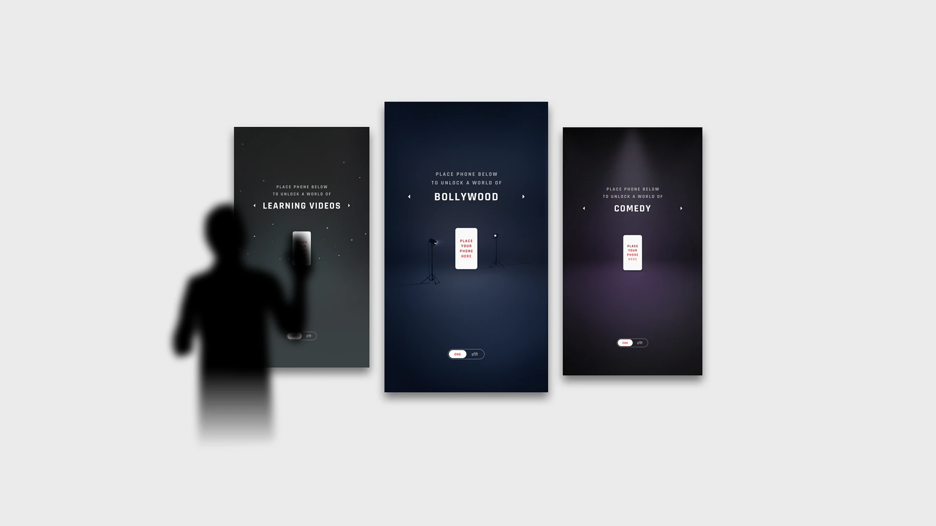 Three onboarding screens inviting users to place their phone below to unlock a world of learning videos, Bollywood, or comedy.