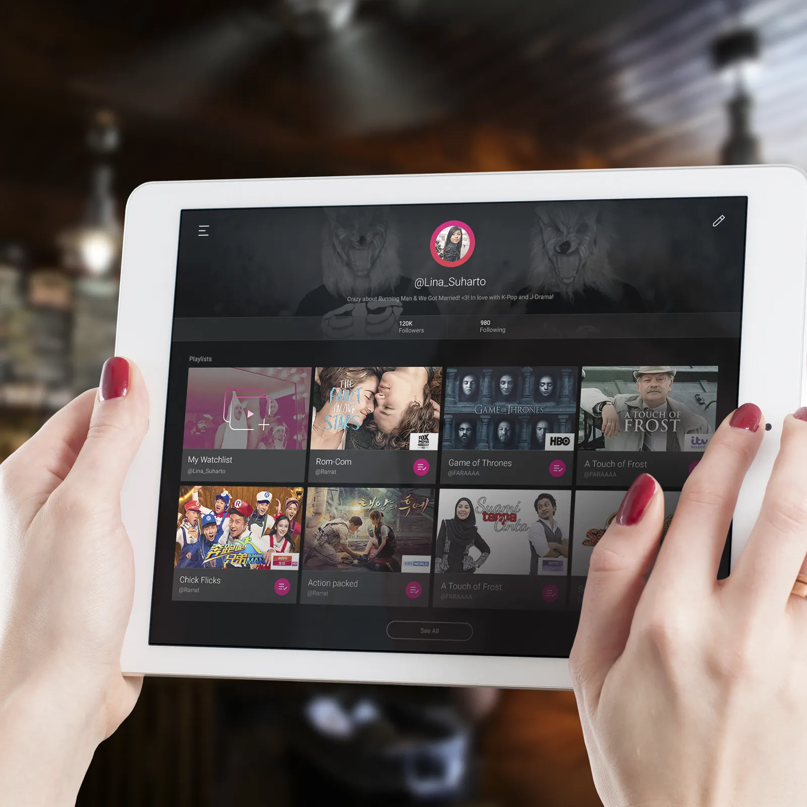 Browsing playlists on a tablet.